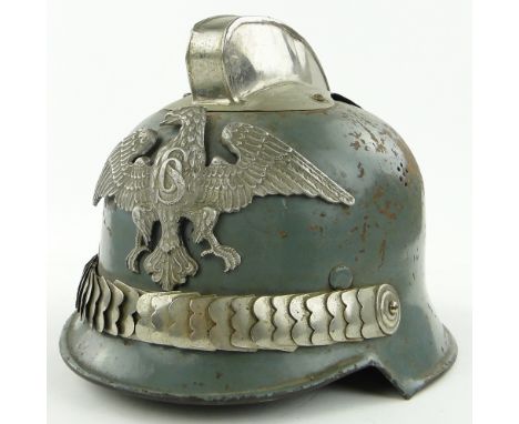 A Second World War German fireman's helmet.