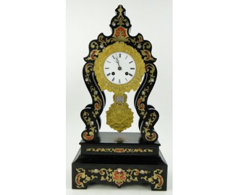 A 19th century boulle marquetry cased continental mantel clock,
with white enamel dial and 2-train movement, height 1'8".