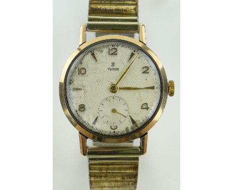 A gent's Vintage Tudor gold cased wristwatch,
with plated expanding strap, case width 32mm.