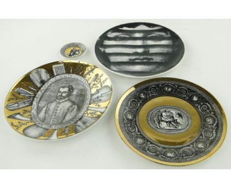 A Fornasetti modernist portrait plate,
10.5", 2 others and a smaller plate, (4).