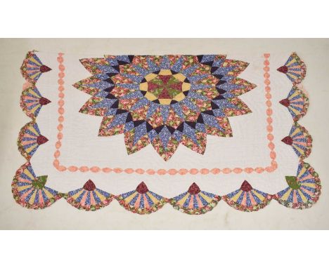 Vintage patchwork quilt, with large geometric medallion to the centre, and repetitive fan border, 212cm x 212cm