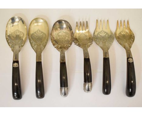 Malaysian white metal serving spoons and forks with ebonised handles, one spoon and fork with the Malaysian coat of arms, 24c