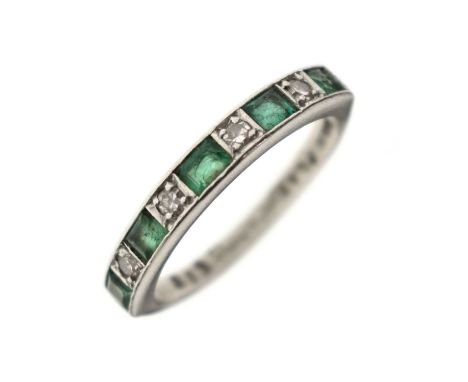 Emerald and diamond platinum half eternity ring, alternate set five step cut emeralds (worn) and four single cut diamonds, st