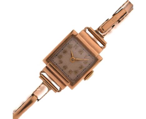 Vintage lady's 9ct gold bracelet watch, the square silvered dial with applied gilt Arabic hour marker, and gilt hands, manual