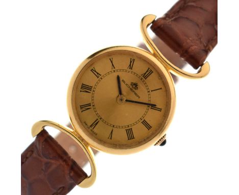 Bucherer - Lady's 18k gold cased wristwatch, the gilt dial with black Roman hour markers and black hands, blue cabochon-set c