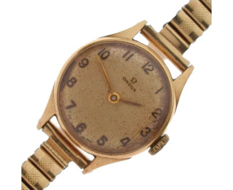 Omega - Lady's vintage 14K cased bracelet watch, the silvered dial with Arabic hour markers, and gilt hand, unsigned crown, s