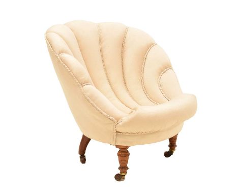 Victorian 'clam shell' nursing chair upholstered in cream fabric, on turned front and splayed back legs, each raised on ceram