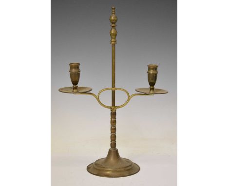 Peerage - Brass adjustable two-branch candelabrum or student's reading lamp, with twin urn sockets and drip trays on adjustab