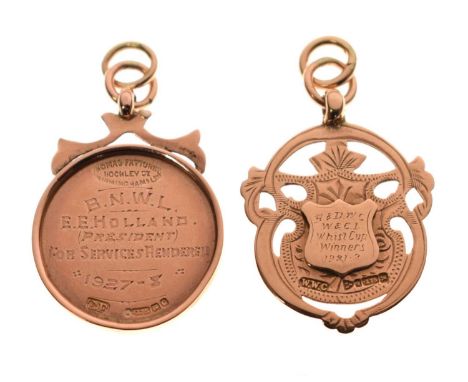 Two 9ct gold fobs, the shield shaped medallion hallmarked for Chester 1901, and the other with white enamel decoration hallma