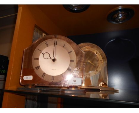 A Smiths retro amber glass fronted mantle clock and another 