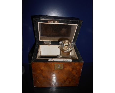 A Victorian burr walnut and silver plated scent bottle caddy lacking one bottle