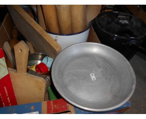 A box of assorted vintage kitchenalia to include rolling pins, scales, bread board, copper sauce pan etc