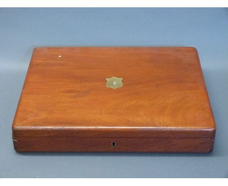 A mahogany pistol box with felt-lined fitted interior to accommodate three percussion pistols and a powder flask, with origin