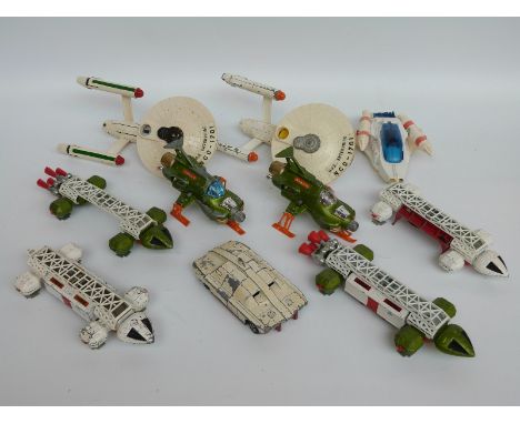 Ten Dinky Toys diecast model novelty, film and TV related vehicles including Star Trek USS Enterprise, Eagle F, UFO Intercept