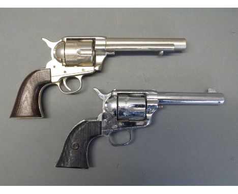 Two Colt replica blank firing Single Action Army .45 six shot revolvers 