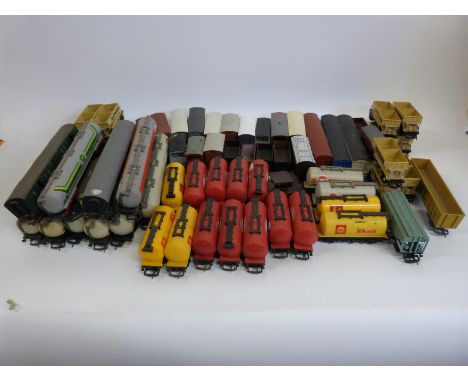 Sixty-five Hornby, Lima and similar 00 gauge wagons and tankers 