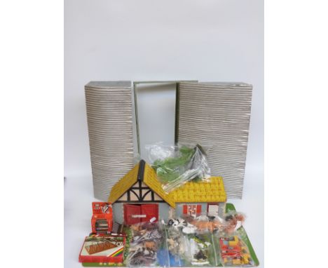 A collection of Britains and similar model farm animals, buildings and accessories, some in original boxes