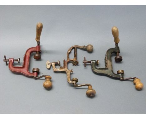 Three cartridge re-loading tools, all with turned wooden handles