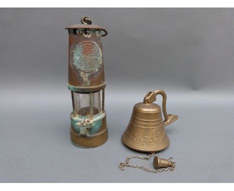 An Eccles miner's lamp and a brass bracket door bell