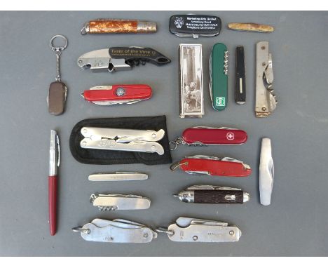 A quantity of folding knives, multi-tools etc to include two military examples, one dated 1945, the other 1955