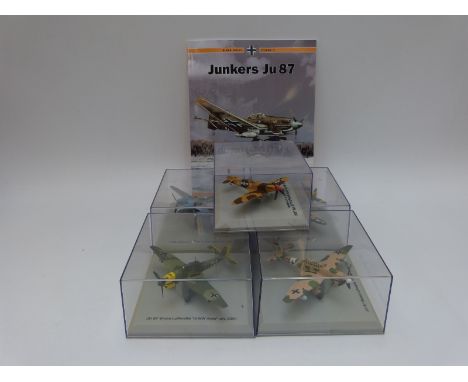 Sixty four diecast model military aeroplanes, all in original display boxes with stands
