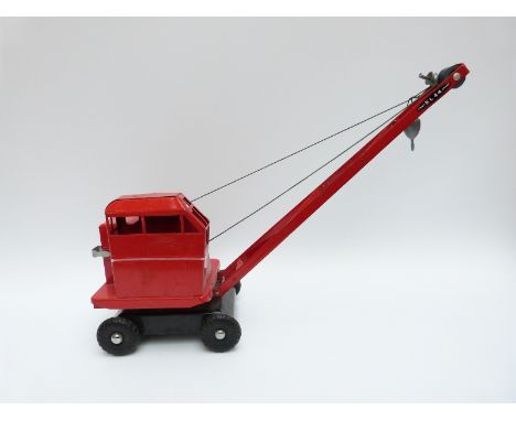 Tri-ang pressed steel model crane with red body and black chassis 