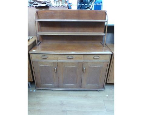A retro light elm/oak sideboard with plate rack, probably Ercol, W120 x D49 x H130cm