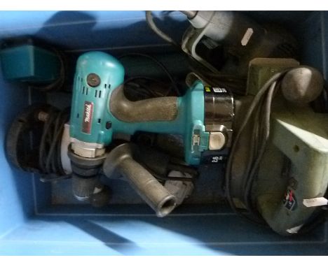 A quantity of Black and Decker, Bosch and Makita power tools including router, cordless drill etc