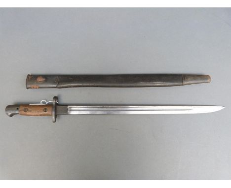 A 1907 pattern bayonet in scabbard, marked to the blade possibly Sander