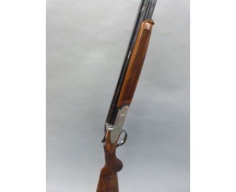 Rizzini Artemis 20 bore over and under shotgun with engraved scenes of ducks and pheasants to the named locks, engraving of d