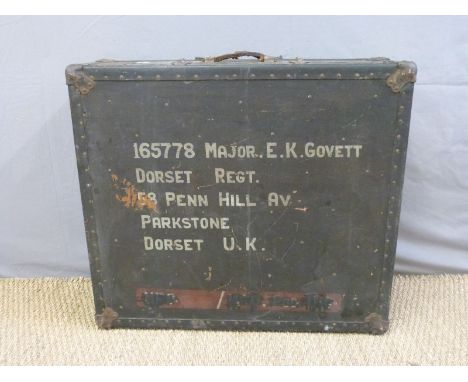 A military interest travelling trunk painted 165788 Major E K Govett Dorset Regiment to both sides