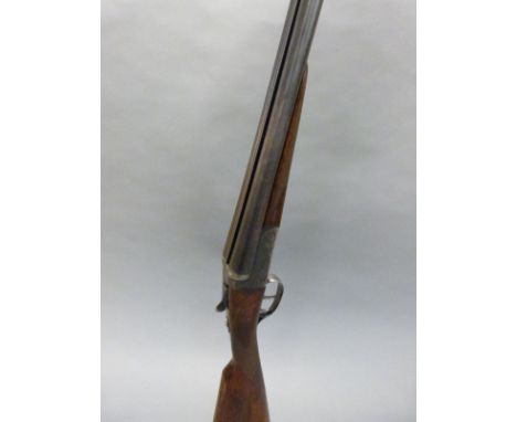 AYA 12 bore side by side ejector shotgun with ornate engraving, named lock and 28inch barrels, chequered stock and double tri