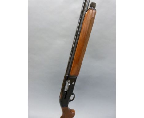 Beretta A 303 12 bore semi-automatic shotgun with engraved locks, chequered semi-pistol grip, single trigger and vented top r