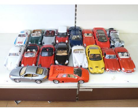 Eighteen Burago 1:18 scale diecast model sports cars including Ferrari, Porsche, Jaguar, Mercedes, BMW etc