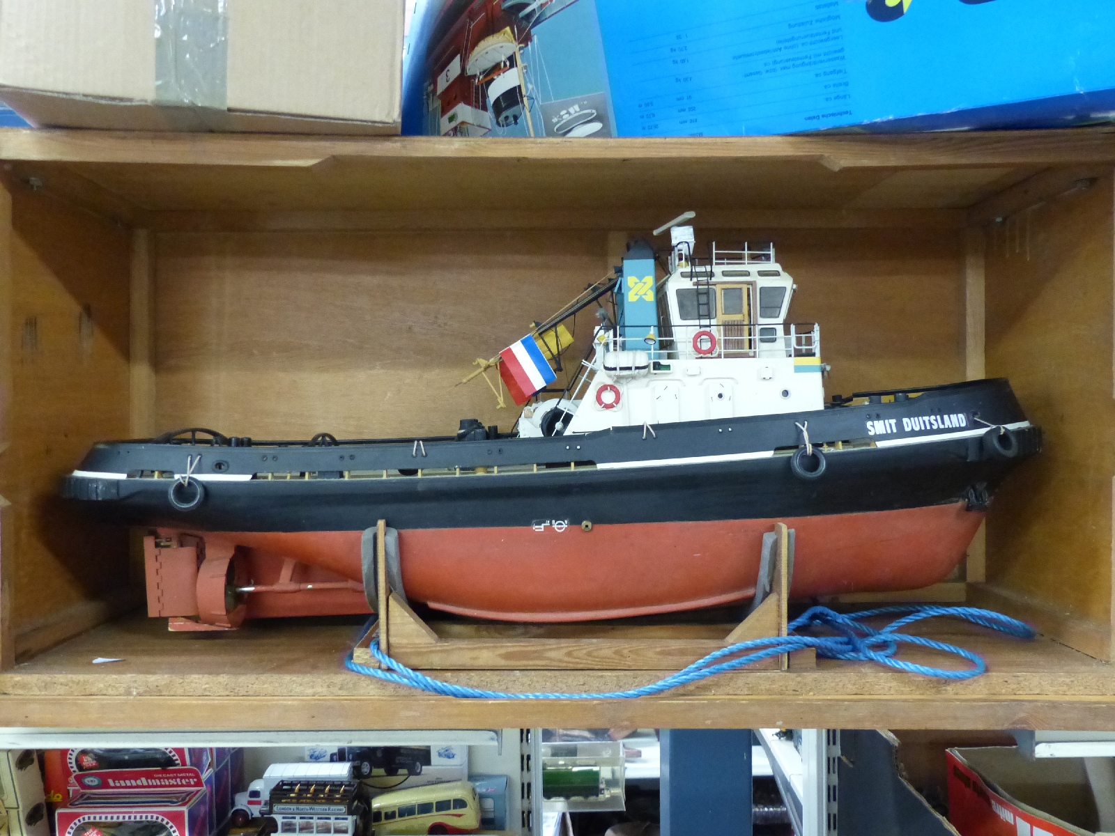A large remote controlled model of a tug boat 'Smit Duitsland' on stand