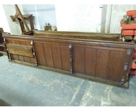 A 19thC oak church pew with shelf to rear, length 236cm, and an oak pew front / rail with fold-down seat, ex St Bartholomew's