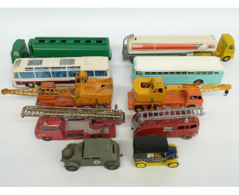 Ten Dinky Toys and Dinky Supertoys diecast model vehicles including fire engines, lorry-mounted cranes, tankers, buses etc to