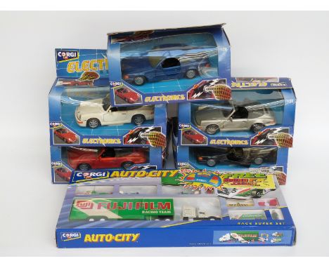 Five Corgi Electronics diecast model cars and a Corgi Auto-City Race Super Set, all in original boxes