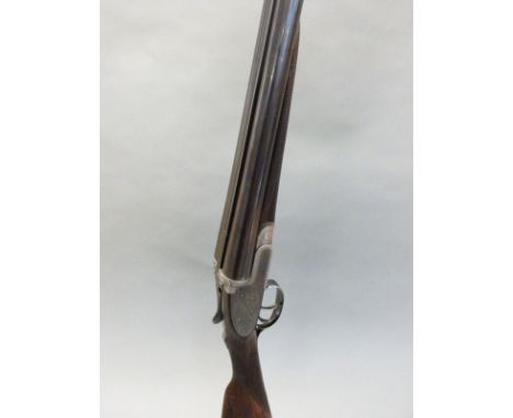 Army & Navy CSL 12 bore side by side shotgun with named and ornately engraved locks, engraved trigger guard, forend, top plat