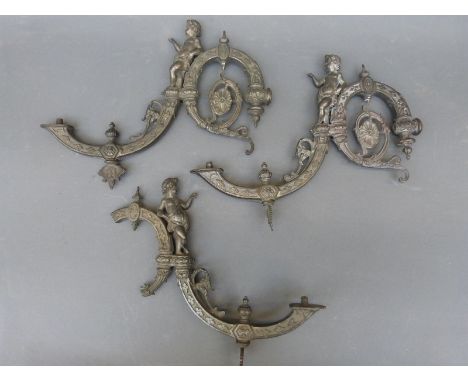 Three figural gas lamp brackets