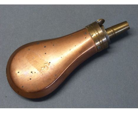 Copper and brass pistol powder flask with bevelled edges, 12cm long. 