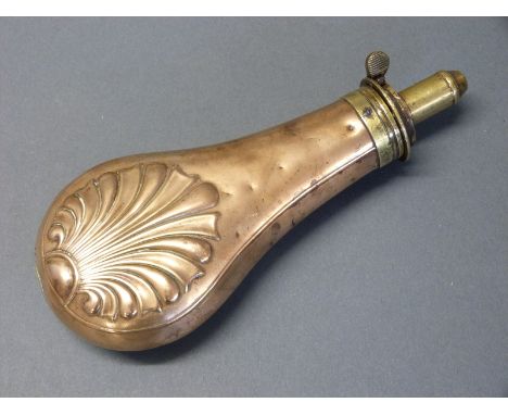 James Dixon & Sons copper and brass powder flask with embossed shell decoration to both sides, 20cm long. 