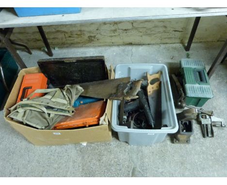 A quantity of tools including vices, saws and power tools