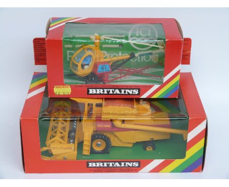 Two Britains model farm vehicles New Holland Combine Harvester 9575 and Helicopter Crop Spray 9511, both in original boxes