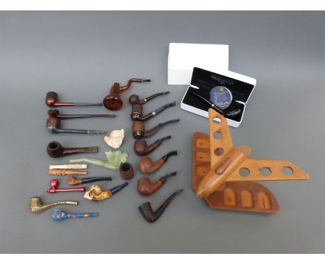 A collection of pipes including boxed Rattray's, Minibert, London Briar, Falcon, jade style etc. 