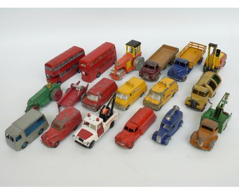 Eighteen Dinky Toys diecast model commercial vehicles including Big Bedford Leyland Comet, tanker, double decker buses etc 