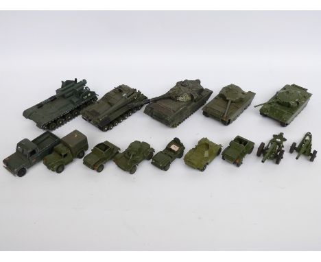 Fourteen Dinky Toys diecast model military vehicles including tanks, guns, Land Rovers etc