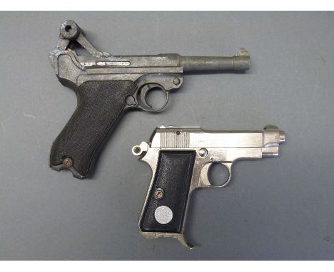 Two replica pistols, a Luger and an Italian Model M 1934 67