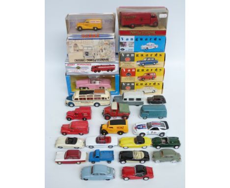 Twenty-eight Corgi, Dinky, Matchbox and Vanguards diecast model vehicles, some in original boxes