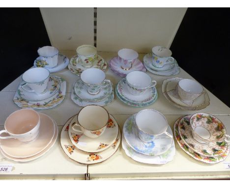 A collection of decorative and collectable trios / cups and saucers including Coalport, Royal Worcester, Art Deco, Shelley et
